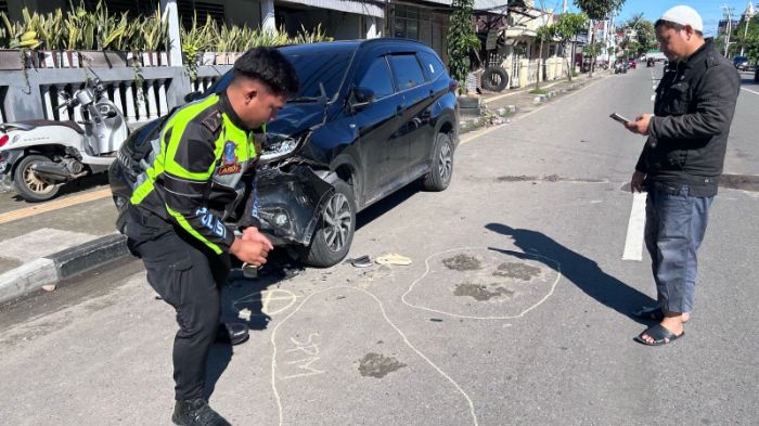 Olah TKP kecelakaan lalu lintas. Foto: Humas Polres Gorontalo Kota