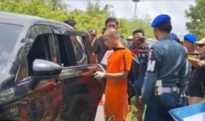 Tersangka Jumran, Oknum TNI AL saat melakukan proses rekontruksi kasus pembunuhan terhadap Jurnalis Juwita.