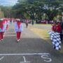Bupati Kab. Gorut, Thariq Modanggu yang didampingi Wakil Bupati, Nurjana Hasan Yusuf saat membuka lomba gerak jalan tingkat kabupaten. Foto: simpulindo