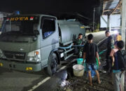 Korban Banjir Biau Terima Bantuan Air Bersih dari Batalyon 824 Mo’E’A Sumalata